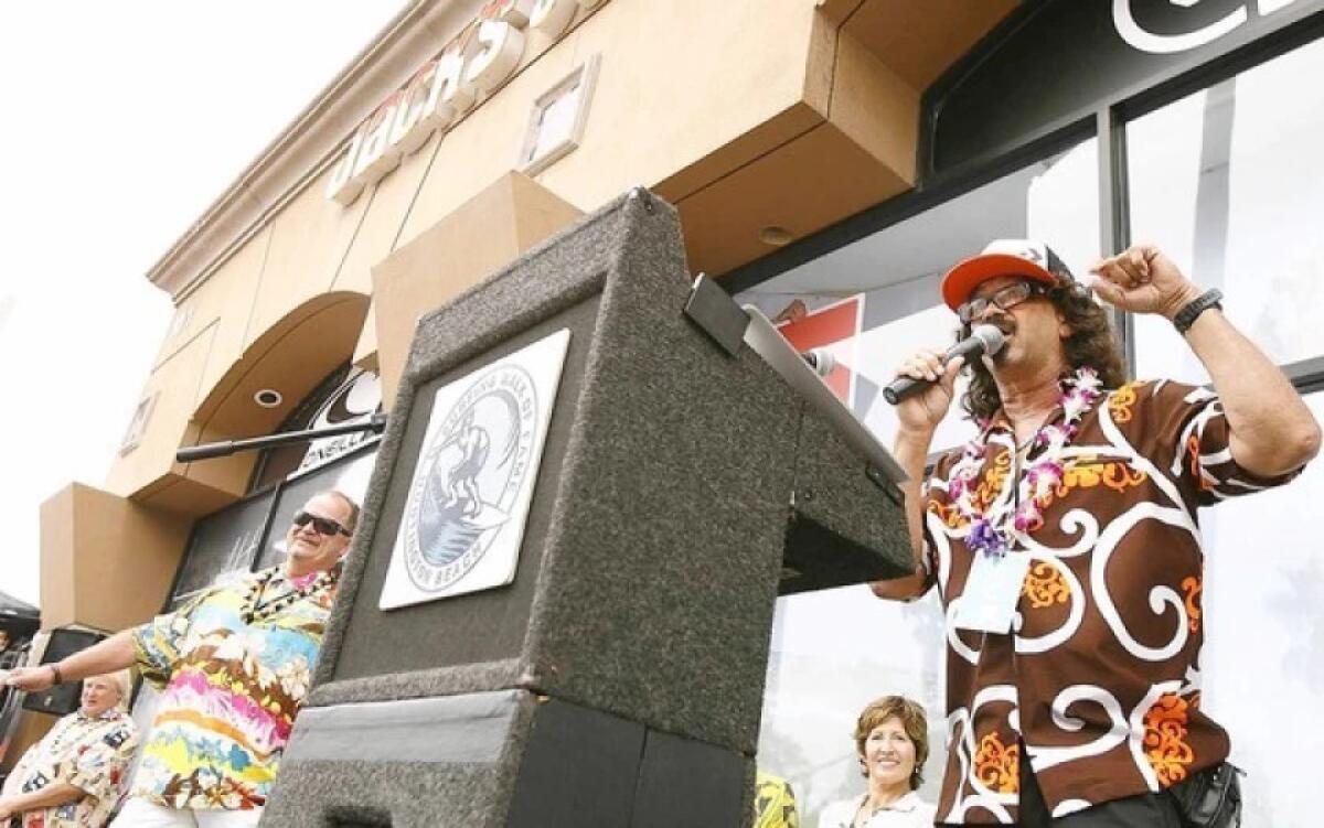 Rick "Rockin' Fig" Fignetti speaks at his Surfing Walk of Fame induction ceremony in 2010.