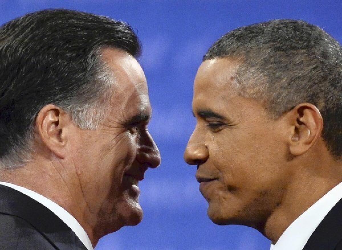 October 22, 2012. President Obama greets Republican presidential candidate Mitt Romney, left, following the third and final presidential debate at Lynn University in Boca, Raton, Fla.