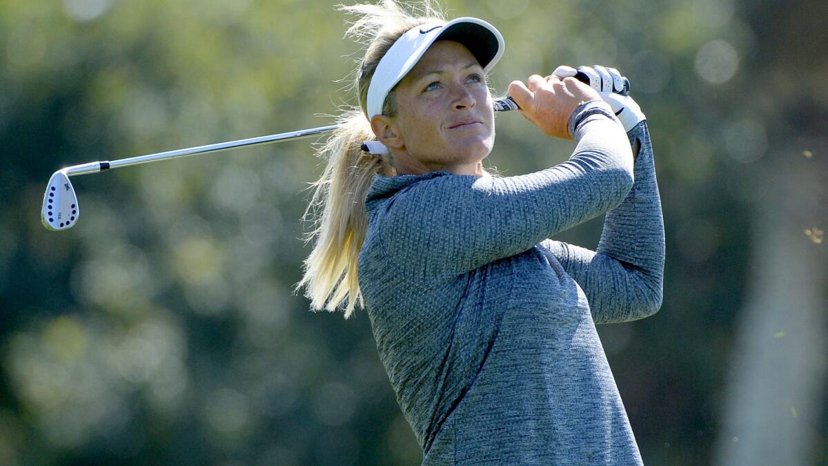 Suzann Pettersen watches her approach shot at No. 15 during the completion of the first round on Friday at the weather- and darkness-delayed ANA Inspiration.