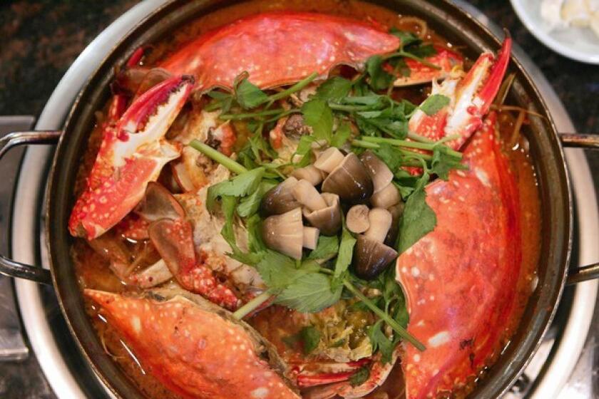 A hot pot at On Dal 2 comes loaded with crab.