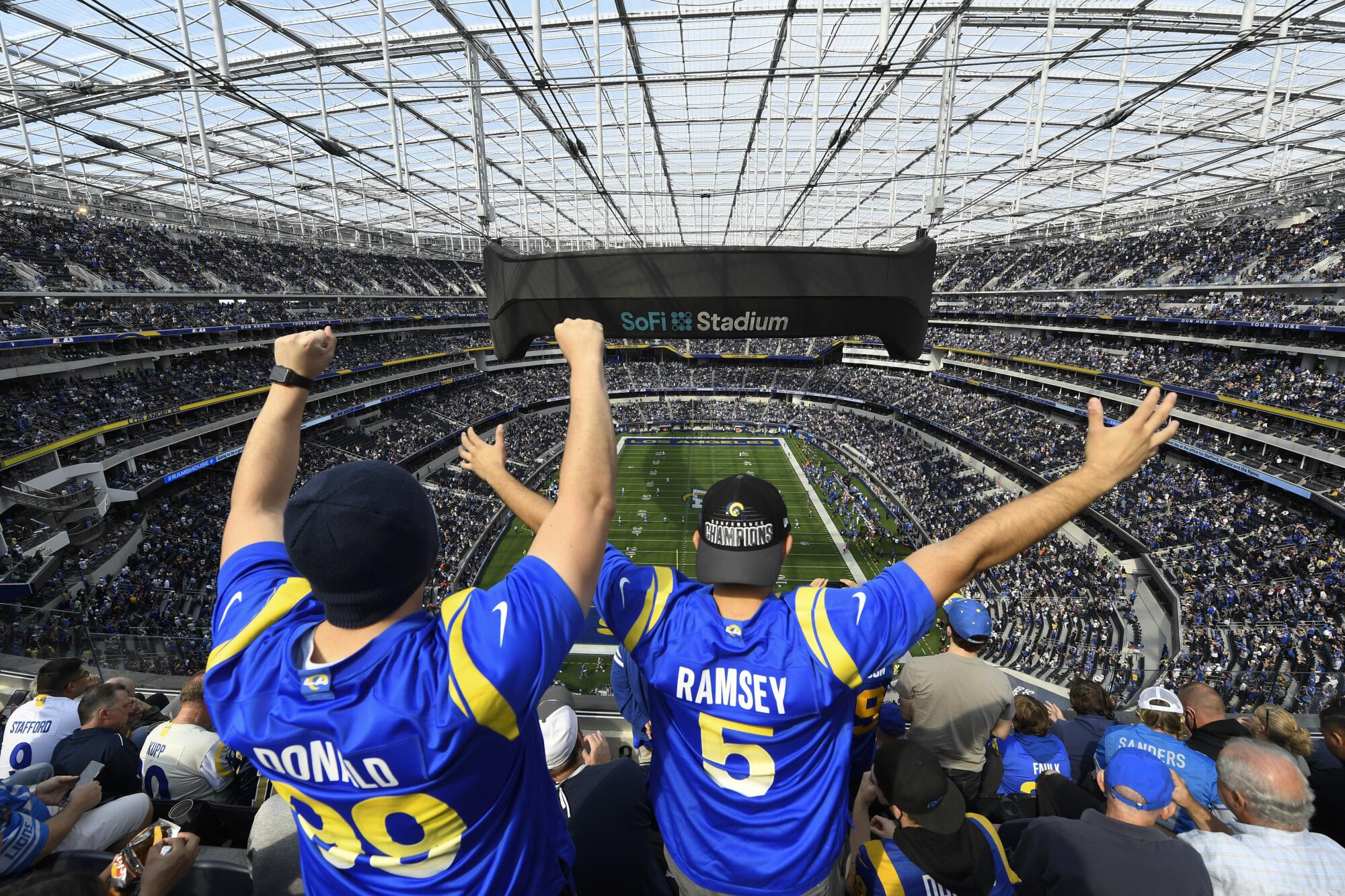 Rams fans look on before a game against the Detroit Lions at SoFi Stadium.
