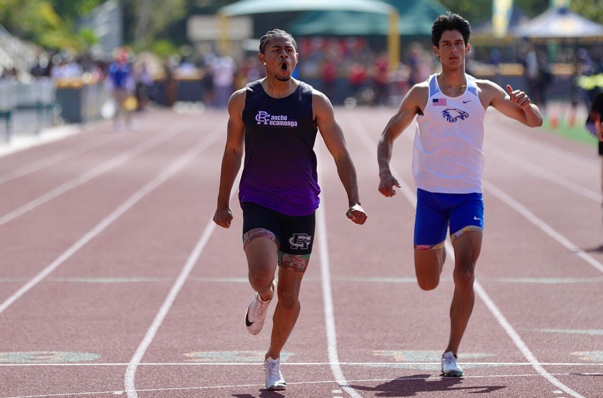 USC-bound RJ Sermons of Rancho Cucamonga celebrates after winning the boys' 200 meters in 20.97 seconds at the Masters Meet.