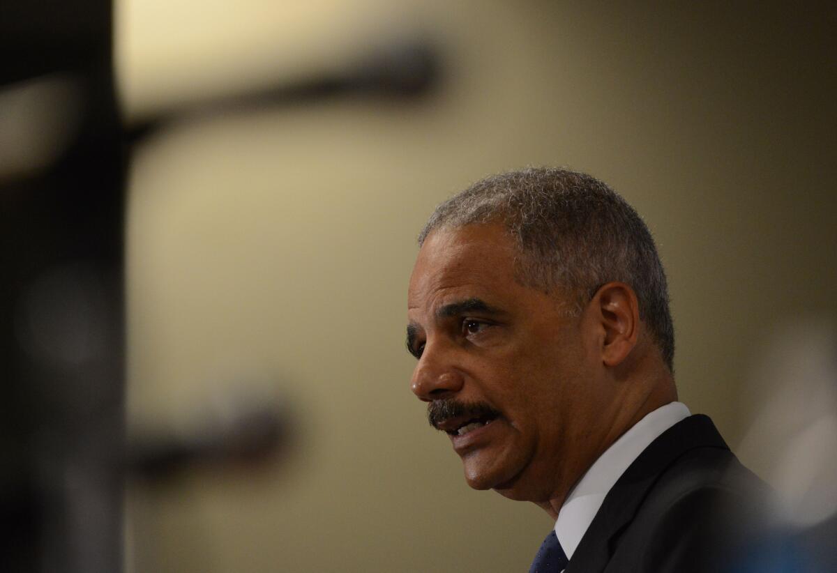 Outgoing Atty. Gen. Eric Holder speaks at the Voting Rights Brain Trust event in Washington.