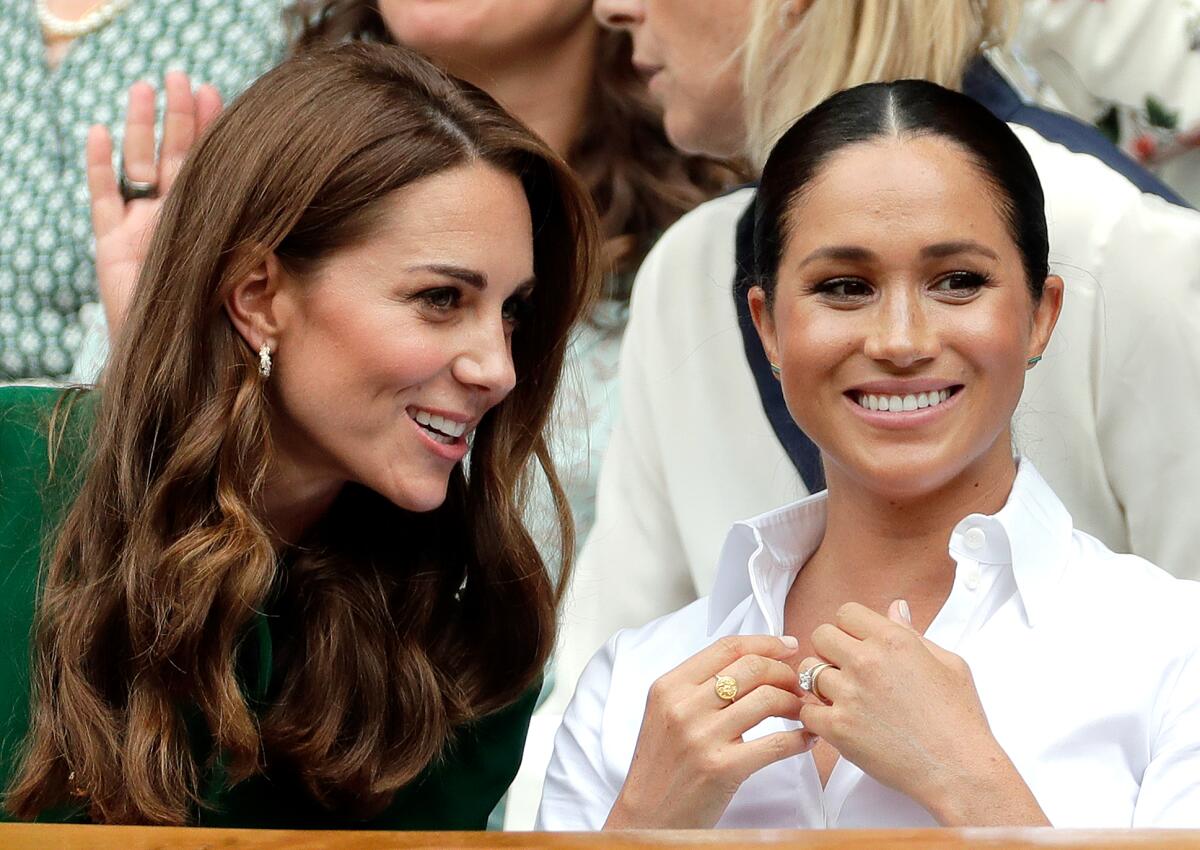 Britain's Kate, Duchess of Cambridge and Meghan, Duchess of Sussex