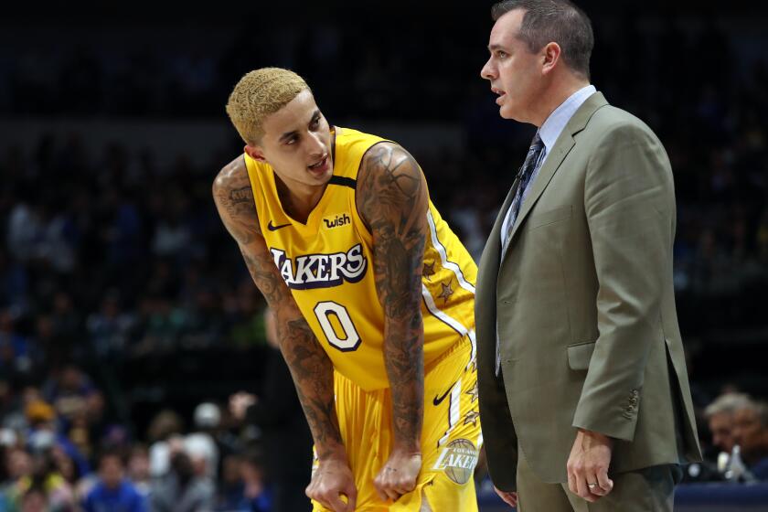 DALLAS, TEXAS - JANUARY 10: Kyle Kuzma #0 of the Los Angeles Lakers and Frank Vogel at American Airlines Center on January 10, 2020 in Dallas, Texas. NOTE TO USER: User expressly acknowledges and agrees that, by downloading and or using this photograph, User is consenting to the terms and conditions of the Getty Images License Agreement. (Photo by Ronald Martinez/Getty Images)