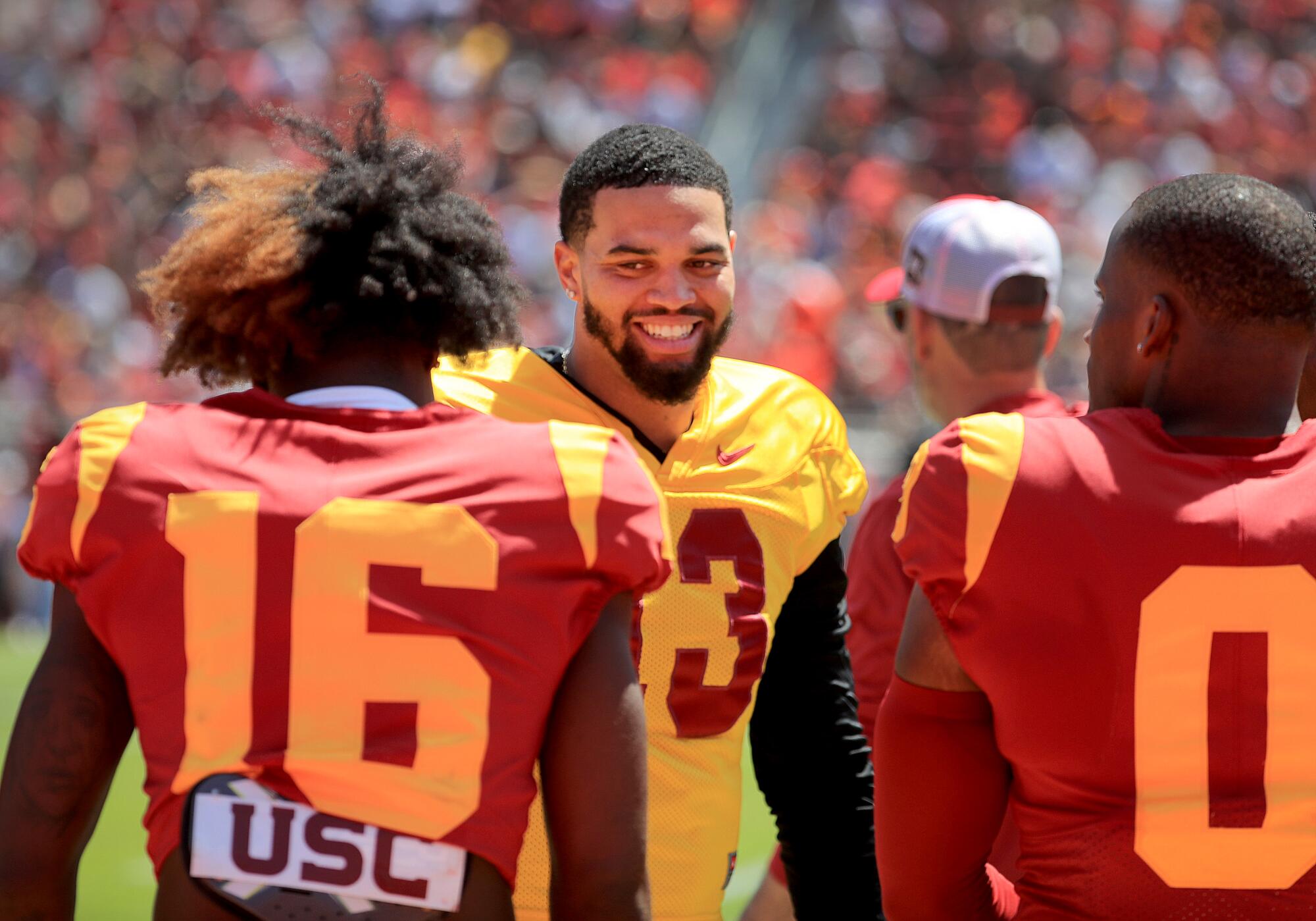 USC quarterback and Heisman Trophy winner Caleb Williams jokes with teammates during the spring game in April 