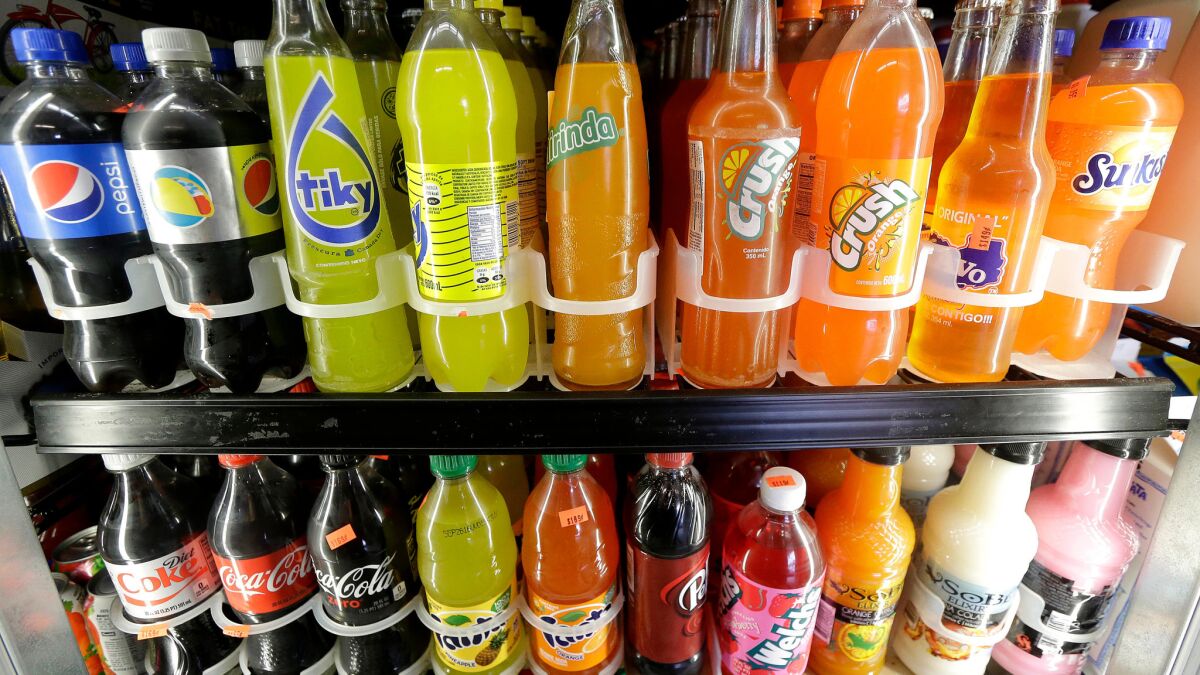 To reduce obesity and diabetes, the World Health Organization on Tuesday recommended widespread implementation of a soda tax that would raise the price of sugary drinks by 20% to 50%.