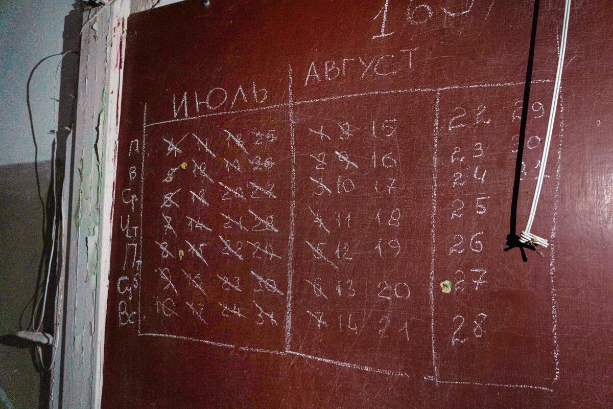A chalkboard with numbers written on it 