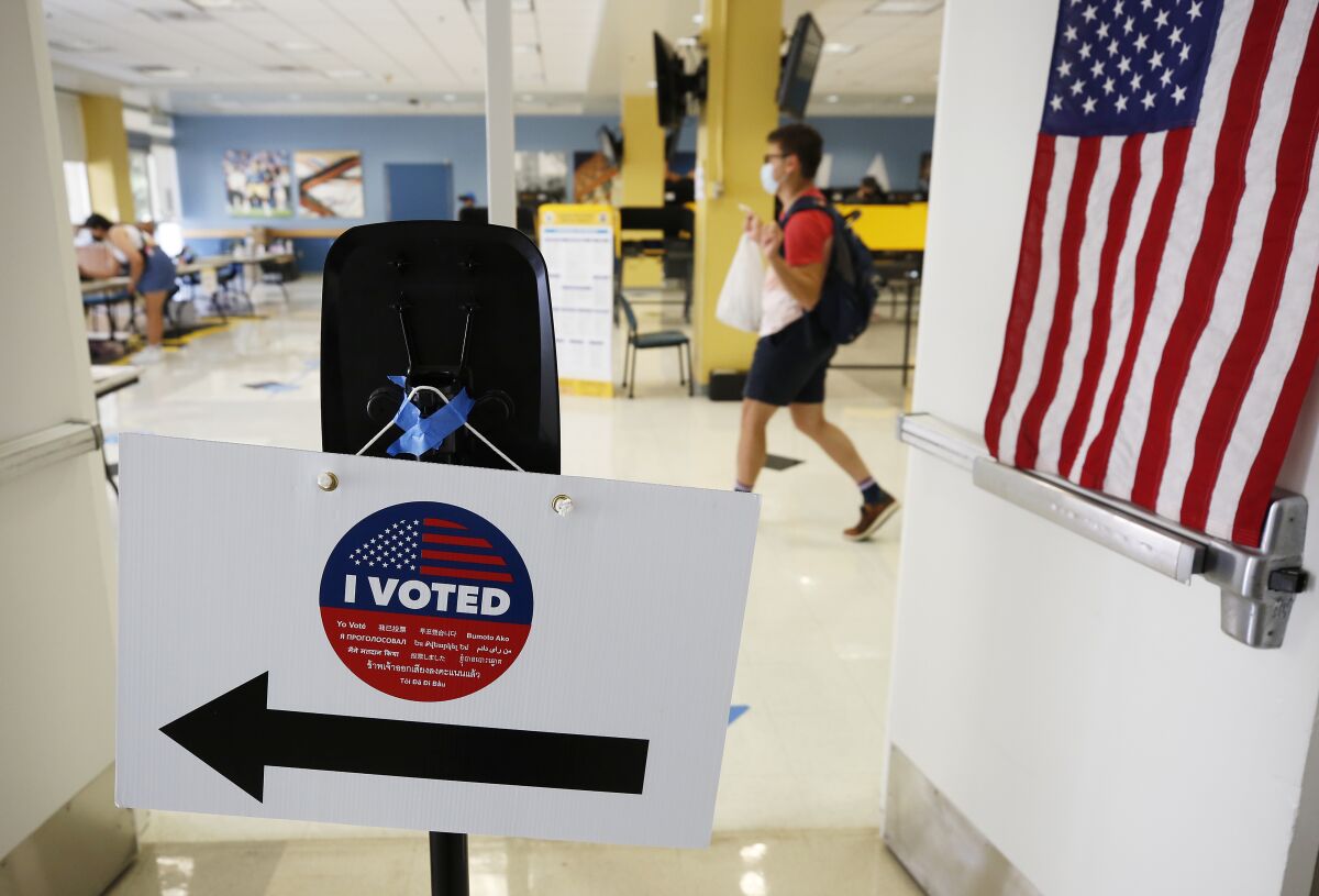 Students and other voters cast their ballots at UCLA's Ackerman Union on Sept. 14.