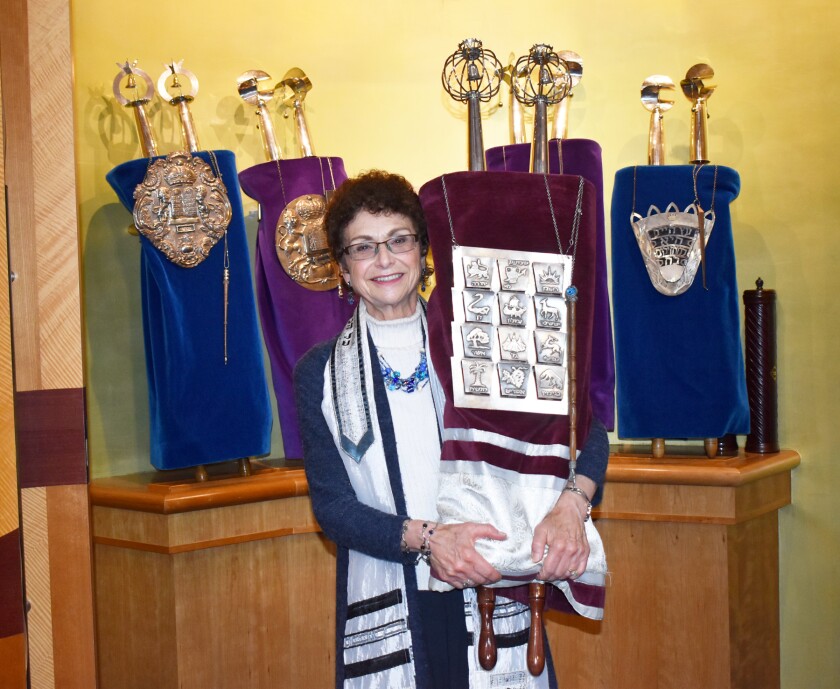 Cantor Lori Wilinsky Frank holding a Torah at Temple Adat Shalom in Poway on May 6.