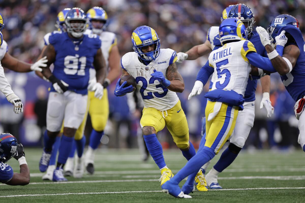 The Rams' Kyren Williams (23) finds running room against the New York Giants.