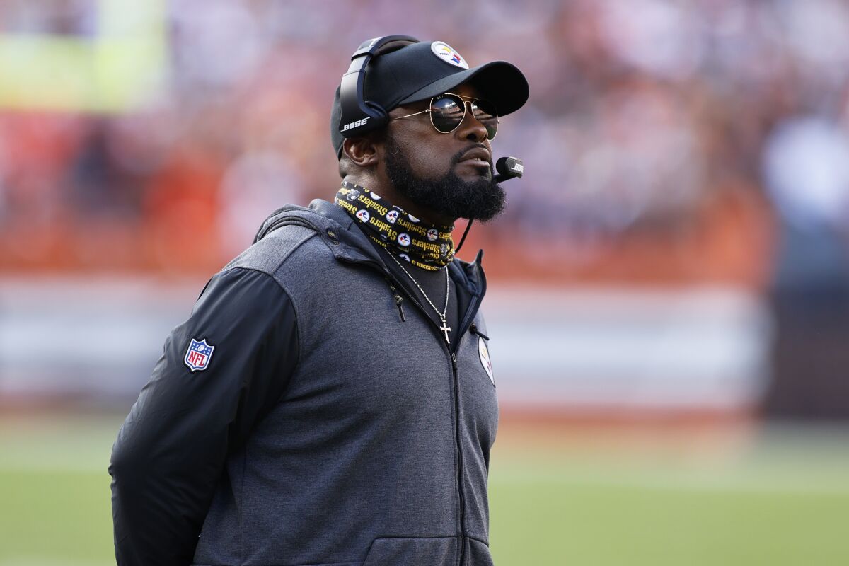 Pittsburgh Steelers head coach Mike Tomlin watches during the first half of an NFL football game against the Cleveland Browns, Sunday, Oct. 31, 2021, in Cleveland. (AP Photo/Ron Schwane)