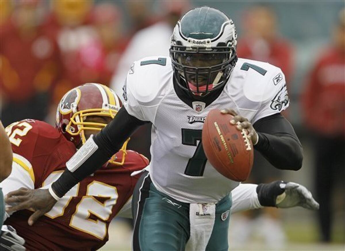 Former Eagles quarterback Michael Vick retires from the NFL