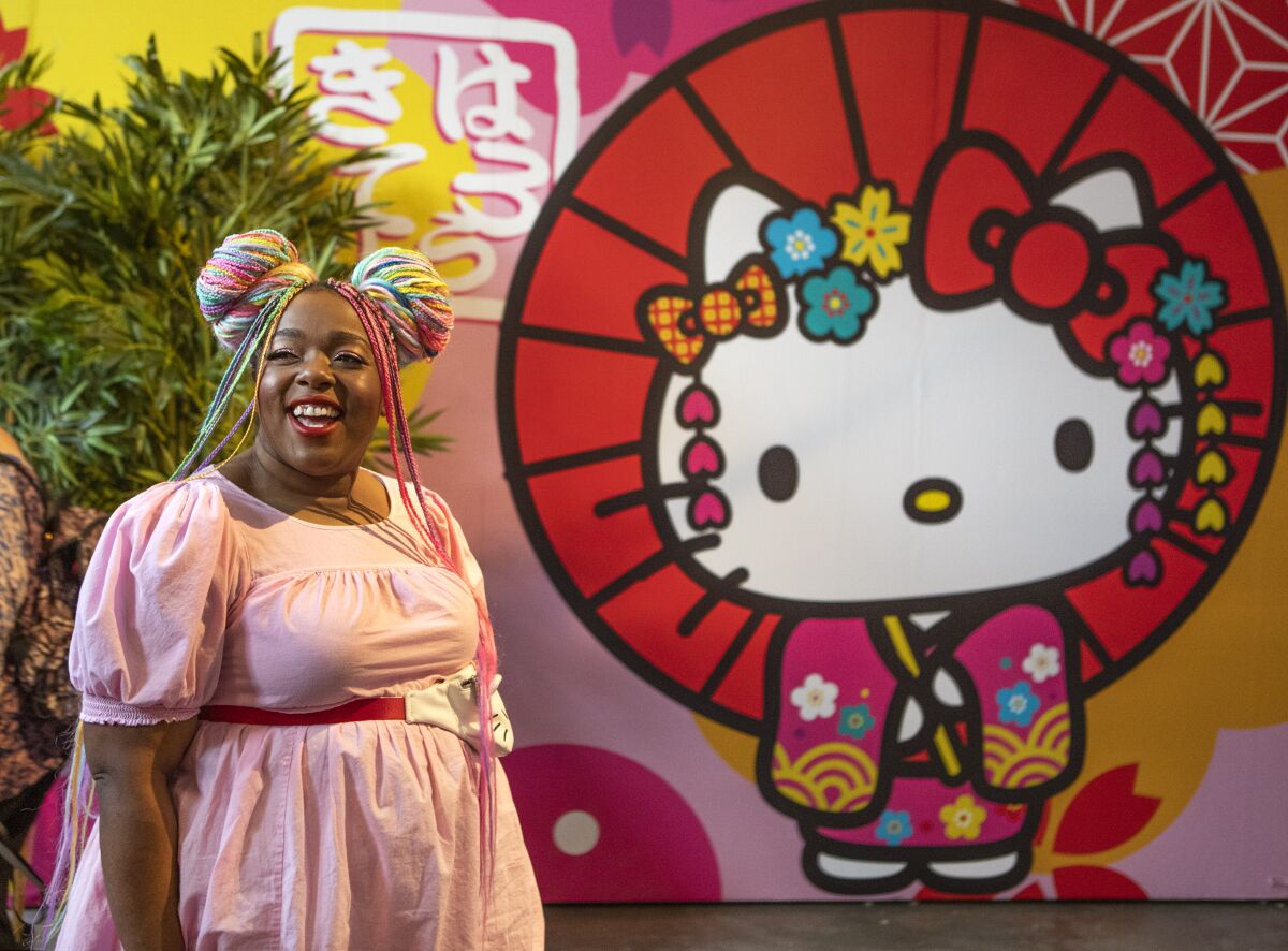 Amina Mucciolo of Los Angeles tours the Tokyo room inside the Hello Kitty Friends Around the World Tour inside L.A. Plaza Village in downtown Los Angeles. 