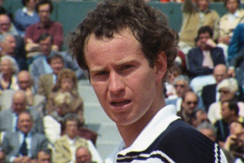 This image released by Oscilloscope Laboratories shows John McEnroe in a scene from the film, "John McEnroe: In the Realm of Perfection." (Oscilloscope Laboratories via AP)