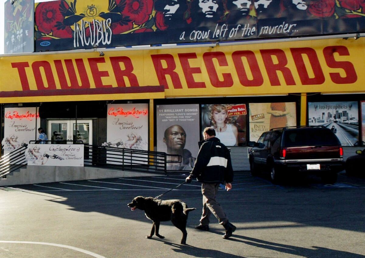 In 2004, Tower Records on the Sunset Strip was a recognizable landmark with its distinctive yellow and red signage and giant album cover posters.