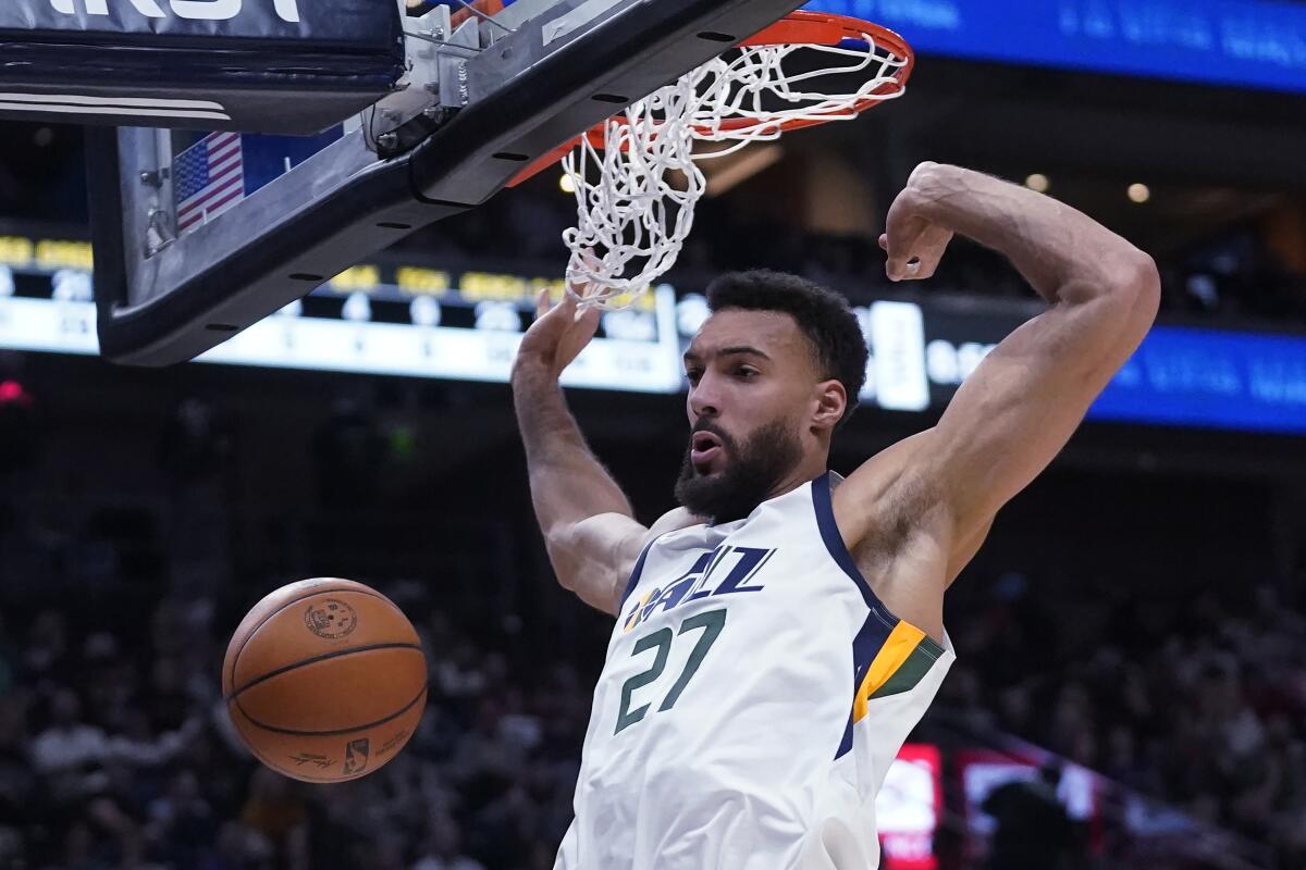 Jazz center Rudy Gobert injures knee seconds into first playoff