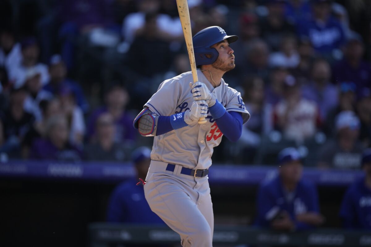 Dodgers center fielder Cody Bellinger bats against the Rockies.