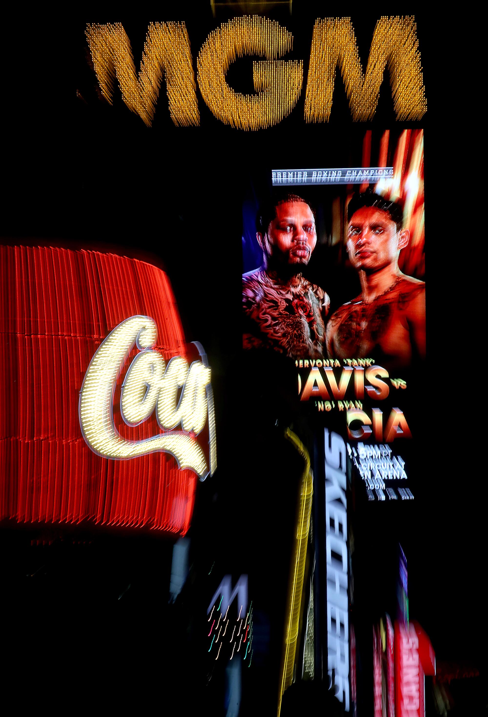 A sign advertising the fight between Gervonta Davis and Ryan Garcia glows high above the Las Vegas Strip 