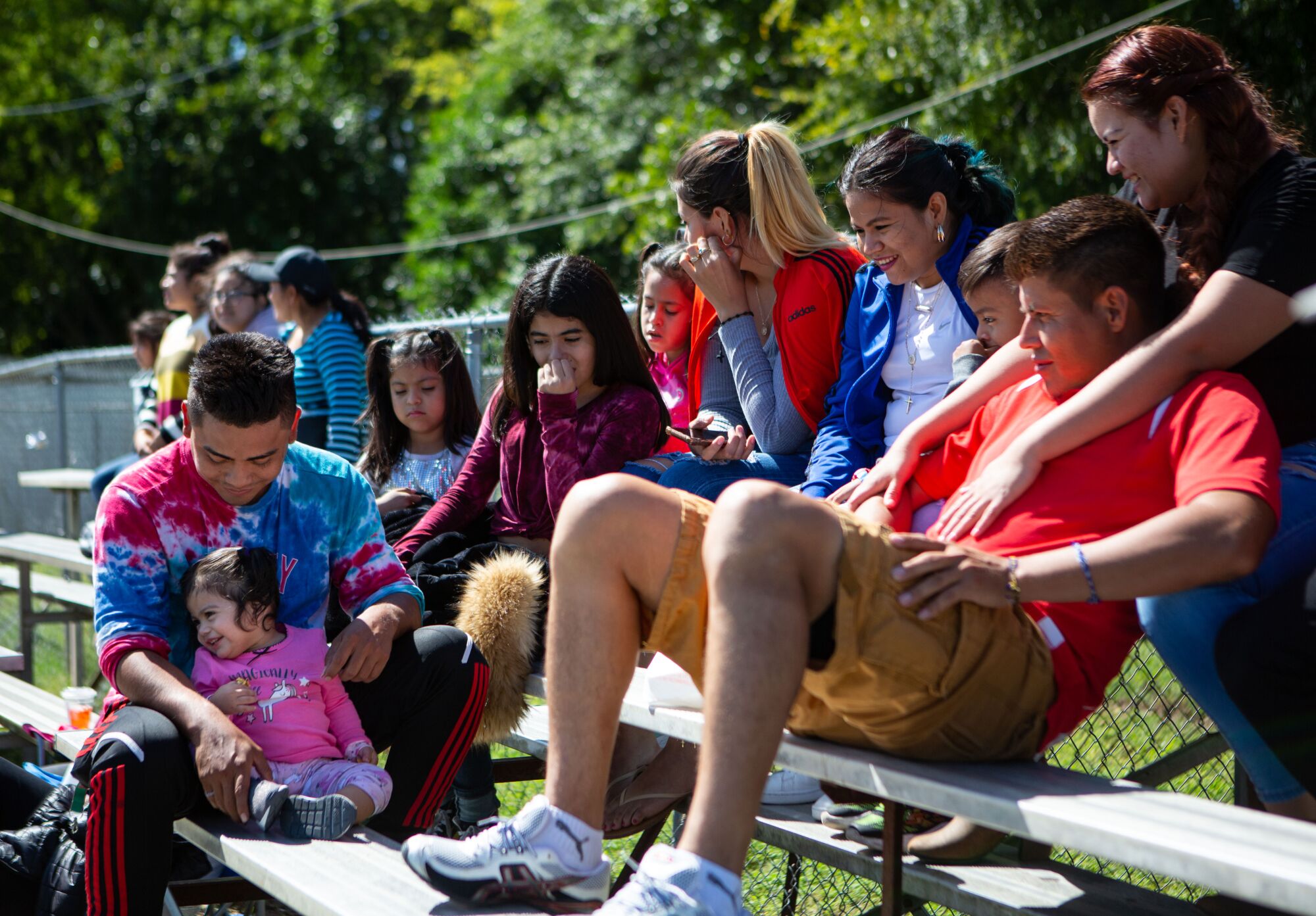 Families gather to enjoy a soccer game in Raleigh, N.C.