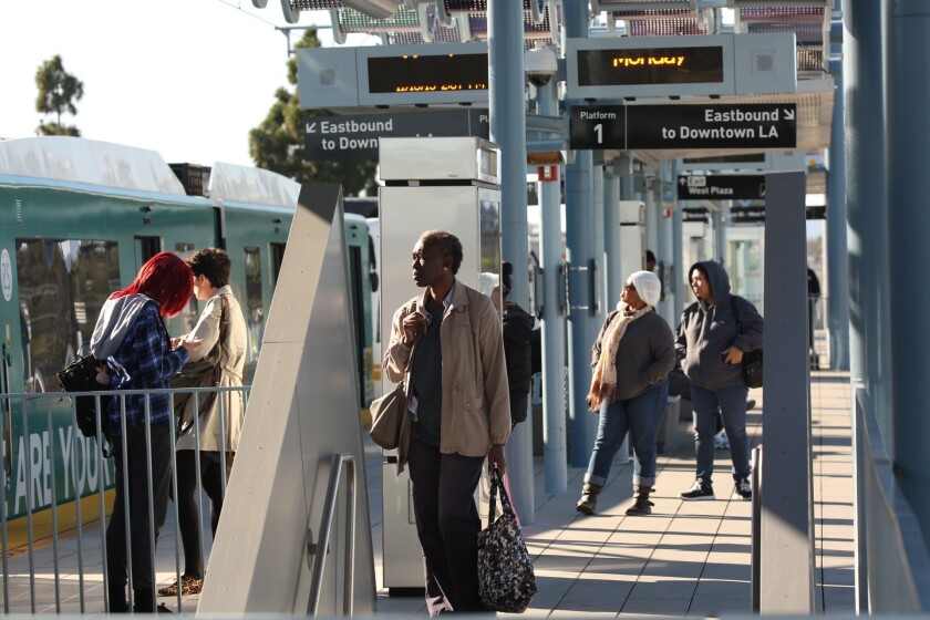 ALS passengers wait to board at the Expo Line Culver City Station.