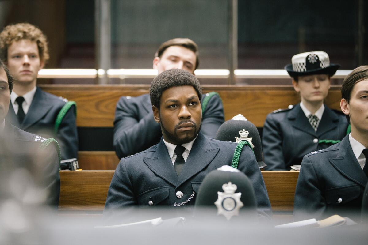 Actor John Boyega in a police uniform in the "Small Axe" series.