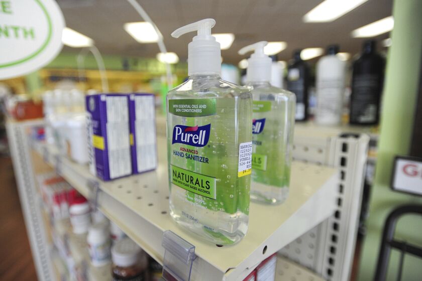 Two bottles of Purell hand sanitizer sit on the shelf at Harrold's Pharmacy in Wilkes-Barre, Pa., Wednesday, March 4, 2020. (Mark Moran/The Citizens' Voice via AP)