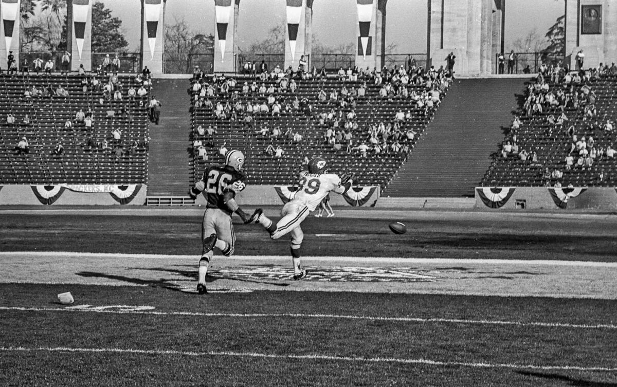 Jan. 15, 1967: A pass for Chiefs' Otis Taylor falls incomplete during first Super Bowl game. Defending is Packers' Herb Adderley, 26. About 62,000 attended the game, short of the 93,000 Memorial Coliseum seats available.