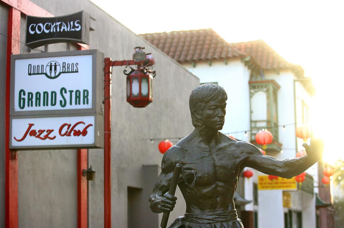 The Chinatown After Dark series is kicking off Thursday. Above, the Bruce Lee statue outside Starry Kitchen in Chinatown.
