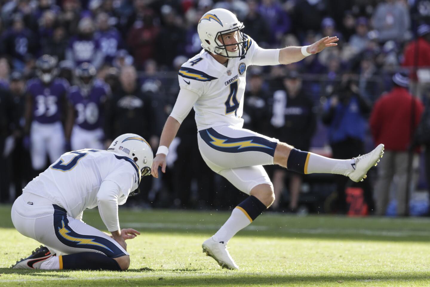 Chargers kicker Michael Badgley kicks the first of four first-half field goals against the Ravens.