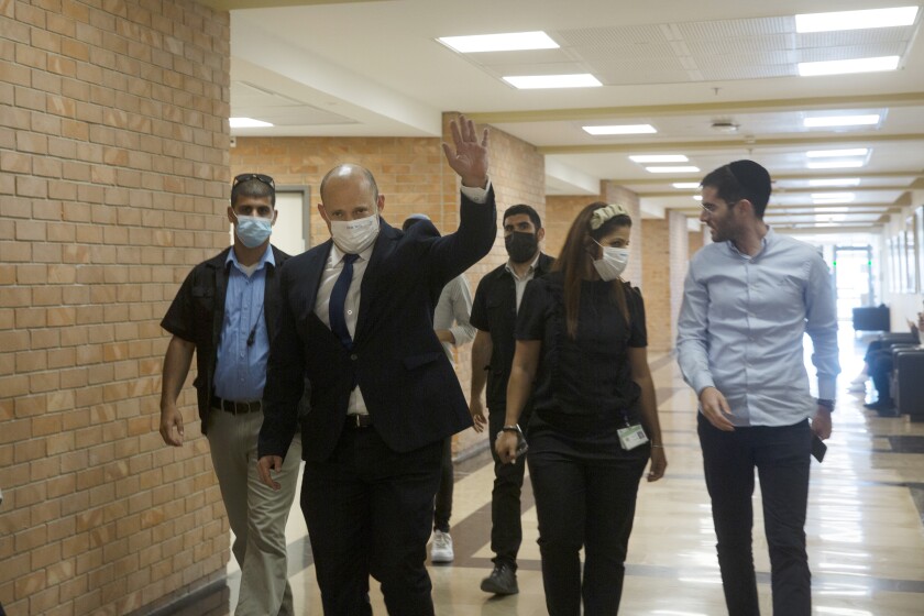 Naftali Bennett, an Israeli parliament member from the Yamina party, arrives to the Knesset, Israel's Parliament, Monday, June 7, 2021. (AP Photo/Maya Alleruzzo, Pool)