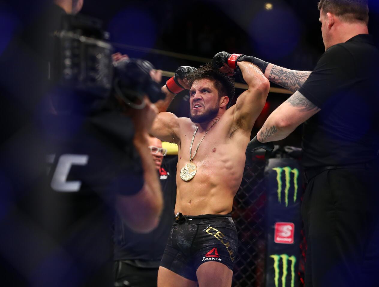 CHICAGO, IL - JUNE 08: Henry Cejudo celebrates his victory over Marlon Moraes of Brazil in their bantamweight championship bout during the UFC 238 event at United Center on June 8, 2019 in Chicago, Illinois. (Photo by Rey Del Rio/Getty Images) ** OUTS - ELSENT, FPG, CM - OUTS * NM, PH, VA if sourced by CT, LA or MoD **