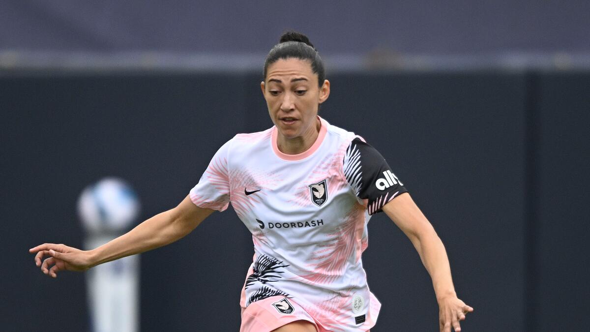 Angel City's Christen Press plays during an NWSL Challenge Cup match against Wave FC.