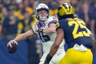 GLENDALE, AZ - DECEMBER 31: TCU Horned Frogs quarterback Max Duggan (15) throws the football.