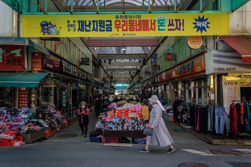 CHUNCHEON, SOUTH KOREA -- SUNDAY, MAY 31, 2020: It's a slow business day at Jungang Market, in Chuncheon, South Korea, on May 31, 2020. (Marcus Yam / Los Angeles Times)