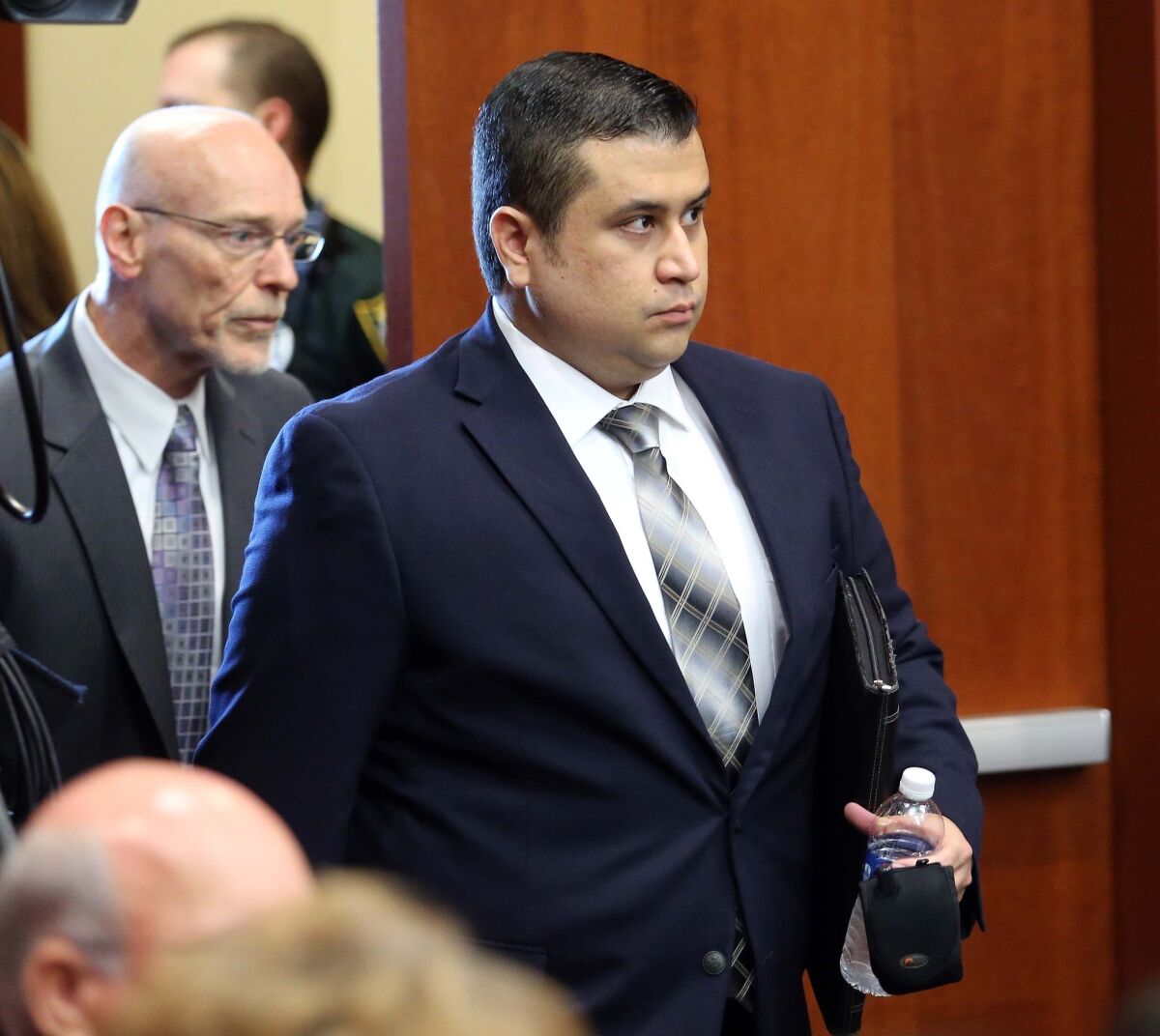 George Zimmerman arrives in circuit court for his trial, along with co-counsel Don West, in Sanford, Fla. Zimmerman is charged in the fatal shooting of unarmed teenager Trayvon Martin.
