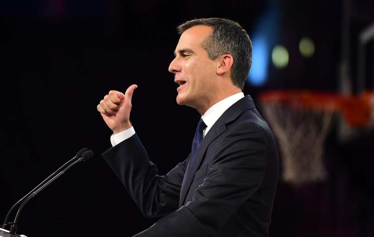 Mayor Eric Garcetti gestures while addressing the audience at the Clippers Fan Festival on Aug. 18