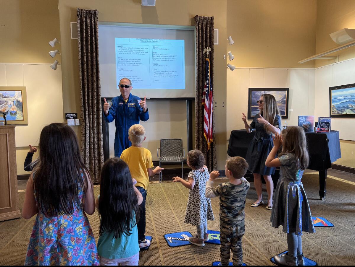 Astronaut and La Jolla High School graduate James Hansen Newman spoke about his career at the La Jolla/Riford Library