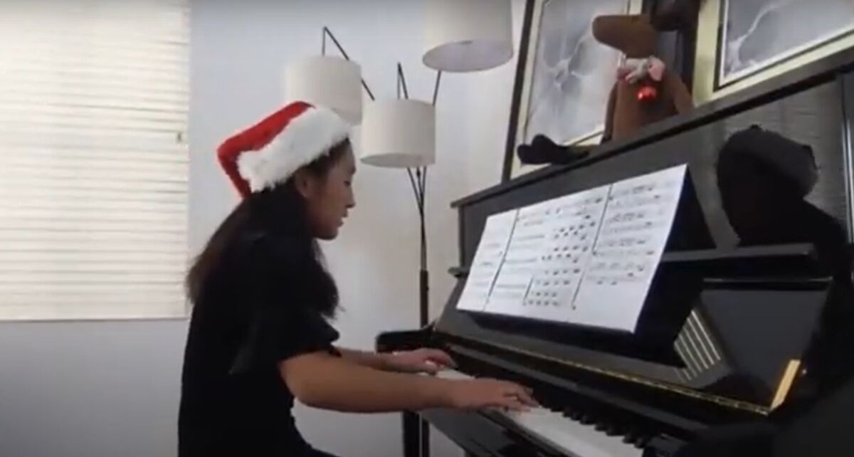 Bishop's School sophomore Grace Sun, 15, performs during the recent online Melodies for Remedies holiday concert.