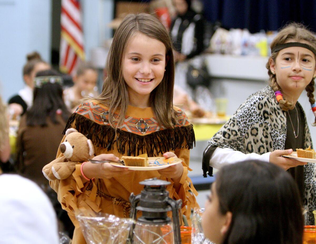 After having turkey and all the trimmings, Kendall Short enjoys pumpkin pie at the annual fifth grade Thanksgiving lunch at La Cañada Elementary in La Cañada Flintridge on Friday, Nov. 18, 2016.