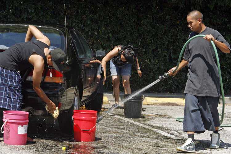 Friends and family of Marvin Laguan hold a car wash fundraiser