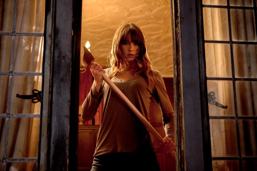 Sharni Vinson stars as Erin in YOURE NEXT in 2013.