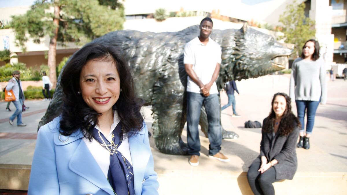 UCLA Foundation President Shirley Wang recently donated $1 million for middle-class scholarships; three students (l to r) Tobi Jekayinfa, Rachel Wilson and Daniela Herrera are middle-class students who recently shared stories of their struggles.