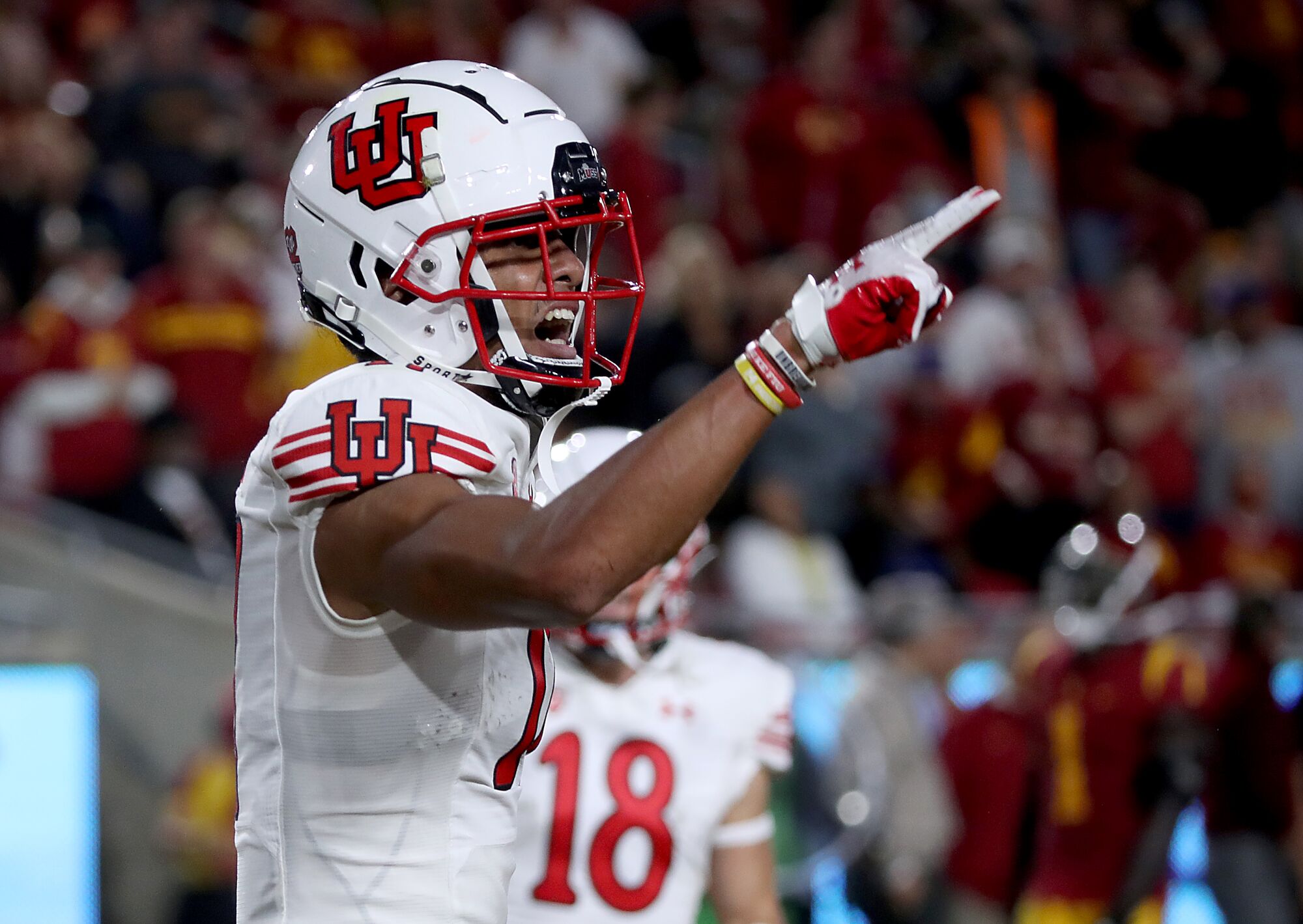 Utah receiver Devaughn Vele reacts after scoring a touchdown against USC in the second half.