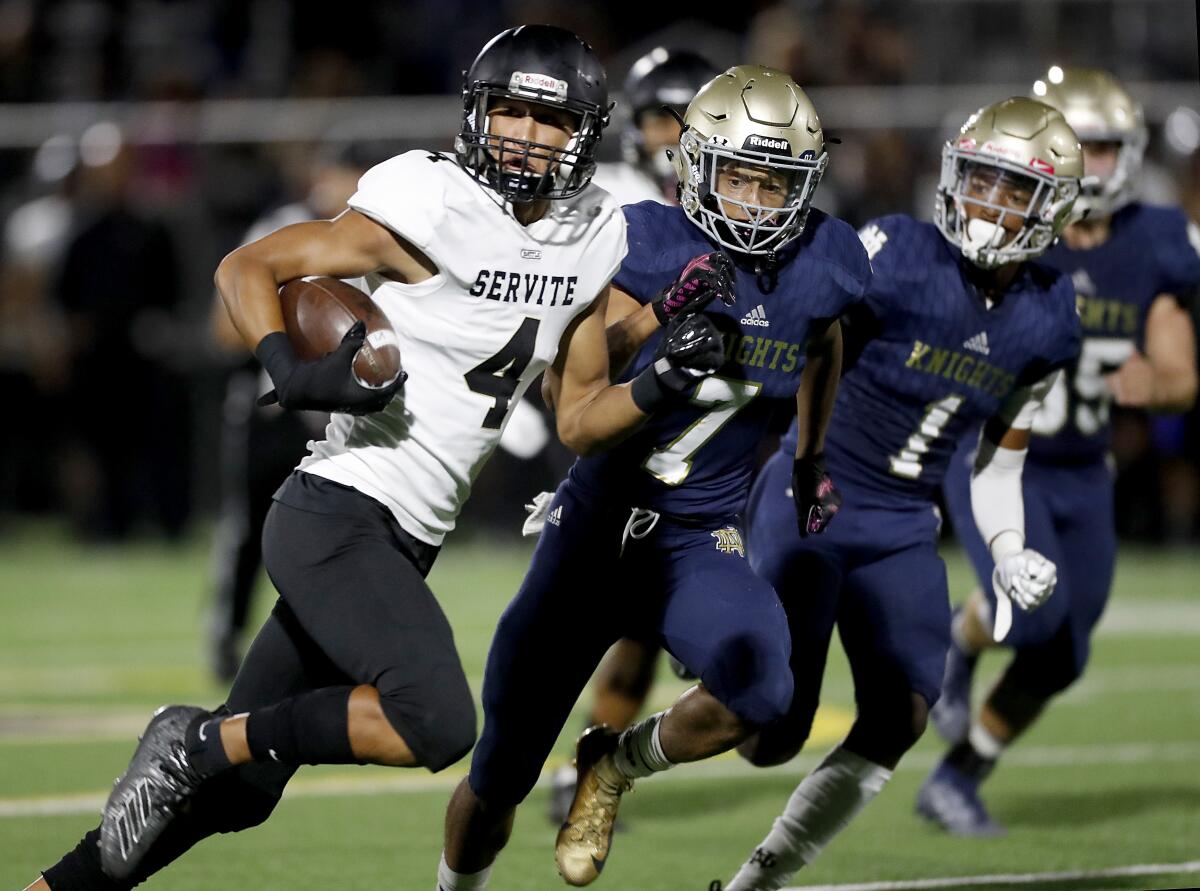 Servite wide receiver Tetairoa McMillan makes a catch against Sherman Oaks Notre Dame in 2019.
