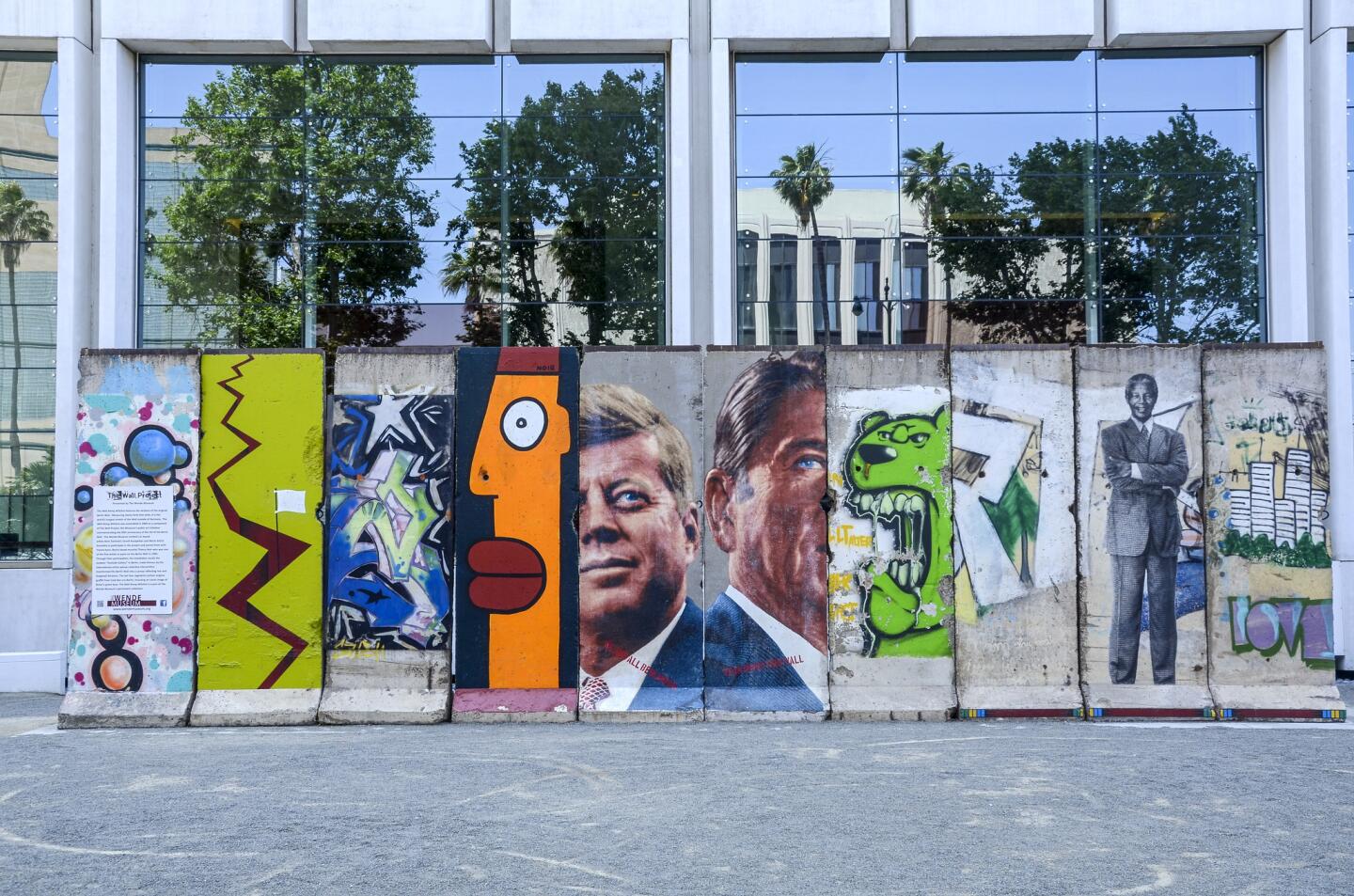 Segments of the Berlin Wall are displayed at 5900 Wilshire Blvd. in Los Angeles. Presented by the Wende Museum.
