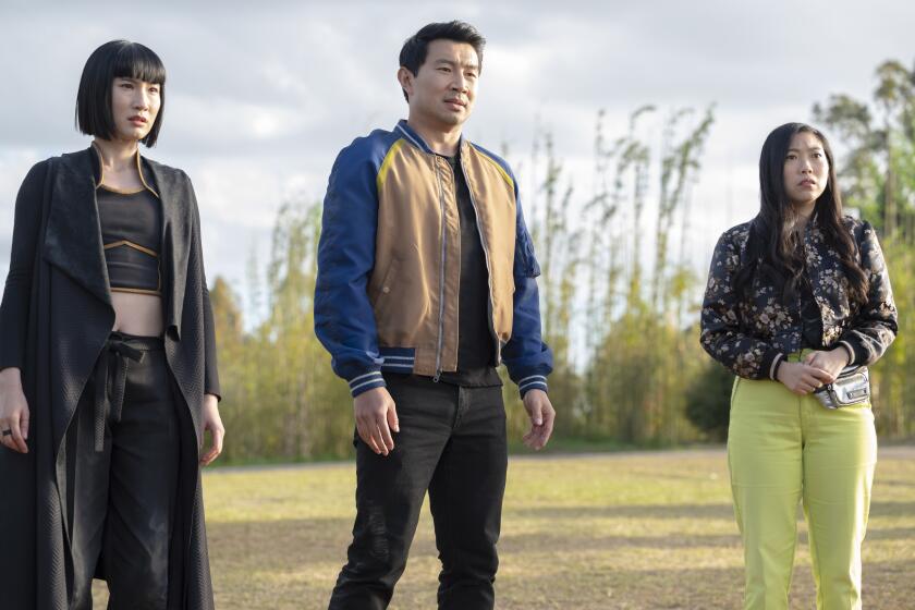 (L-R): Xialing (Meng'er Zhang), Shang-Chi (Simu Liu) and Katy (Awkwafina) in Marvel Studios' SHANG-CHI AND THE LEGEND OF THE TEN RINGS. Photo by Jasin Boland. ?Marvel Studios 2021. All Rights Reserved.