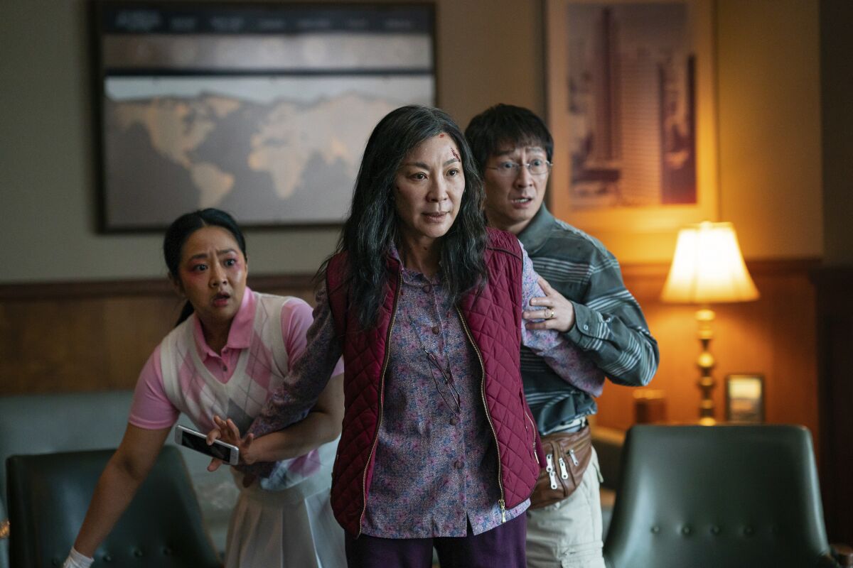 Michelle Yeoh with Stephanie Hsu and Ke Huy Quan in a scene from "Everything Everywhere All at Once."