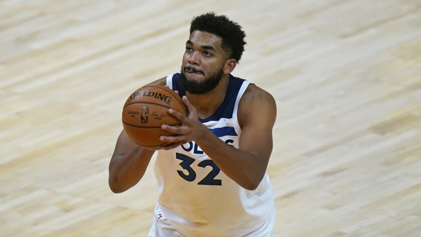 Timberwolves center Karl-Anthony Towns shoots a foul shot
