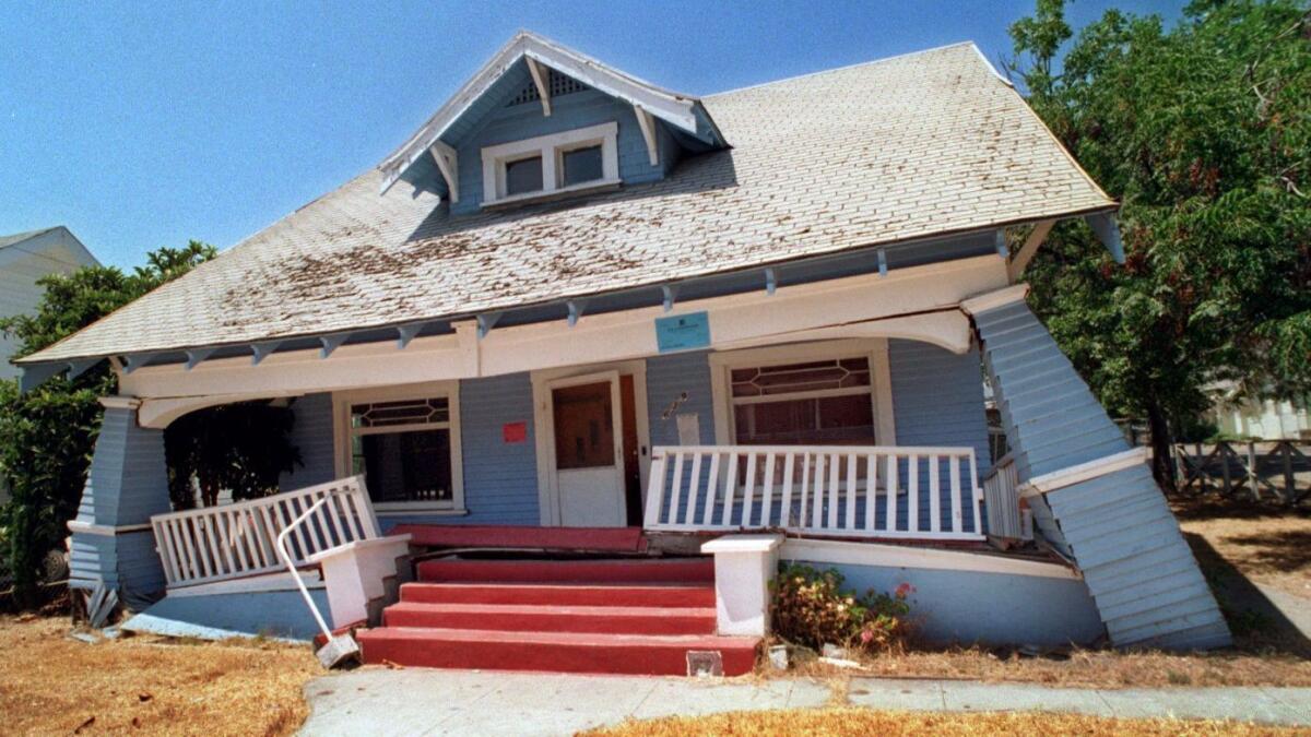 A home in Fillmore, Calif., nearly six months after the 1994 Northridge earthquake. (Joe Pugliese / Los Angeles Times)